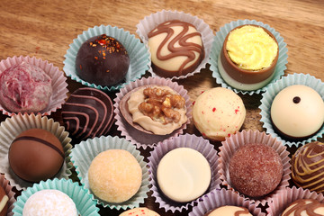 a lot of variety chocolate pralines, belgian confectionery gourmet chocolate praline.