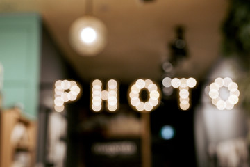Word "Photo" lights on entrance room