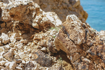 Bright and high contrast rocky stones at the marina in Croatia