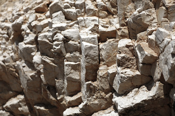 Bright and high contrast rocky stones at the marina in Croatia