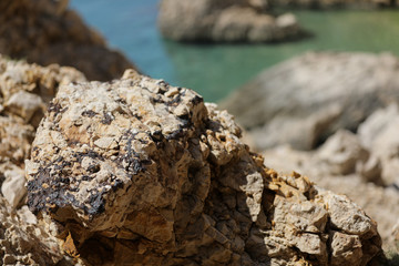 Marina with bright and high contrast rocky stones in Croatia