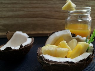 Coconut with fruit and mango juice