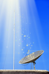 Conceptual image of a satellite dish antenna over night sky with abstract light manipulation