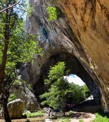 Natural stone bridge in Vratna river gorge in Serbia, called Vratnjanske kapije. This arches is a largest natural bridges in Europe.