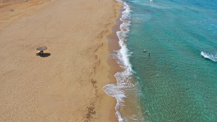 Aerial drone top view photo of famous paradise sandy deep turquoise beach of Falasarna in North...