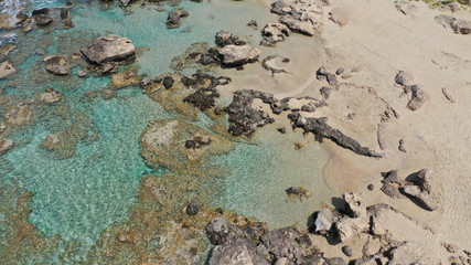 Aerial drone top view photo of famous paradise sandy deep turquoise beach of Falasarna in North West Crete island, Greece