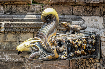 traditional ancient copper water spout in Nepal