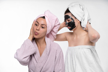 Lesbians have fun in the process of facial cosmetic procedures. Indulge, embrace, tease each other...