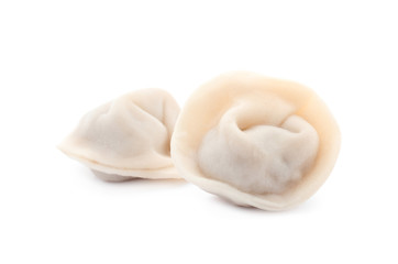 Fototapeta na wymiar Tasty fresh boiled dumplings on white background