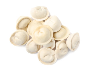 Pile of raw dumplings on white background, top view