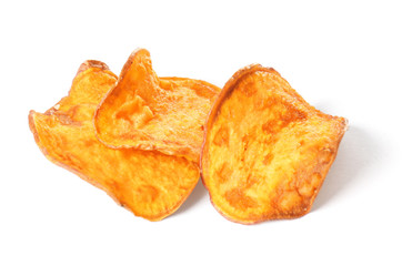 Tasty sweet potato chips isolated on white