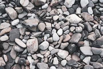 Small Grey pebbles background for home and home interior decoration, simple stones background