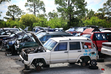 Old junk cars in junkyard