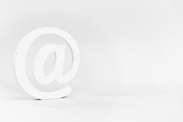 Email sign on blue background. Concept for email, communication or contact us