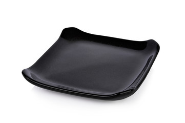 Black empty plate isolated on white background.