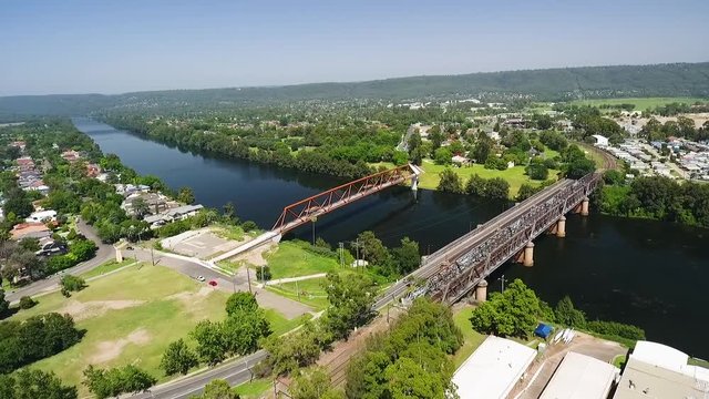 Aerial view of twin bridges over a big river