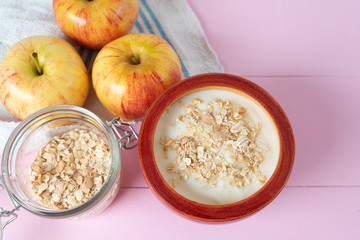Healthy breakfast with apple yogurt and oat