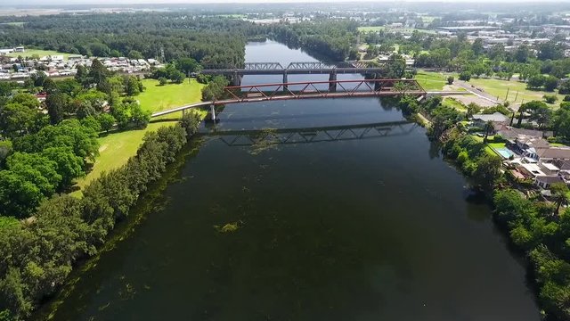 Aerial shot of twin bridges over a river