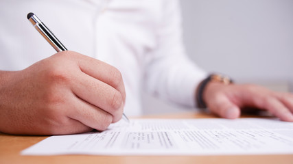 Fototapeta premium Businessman Signing Contract