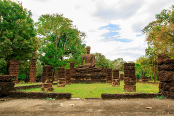 Buddha statue at the ruins in Kamphaeng Phet Historical Park In Thailand, Buddha statue, Old Town,Tourism, World Heritage Site, Civilization,UNESCO.