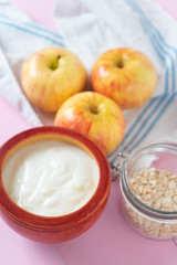 Healthy breakfast with apple yogurt and oat