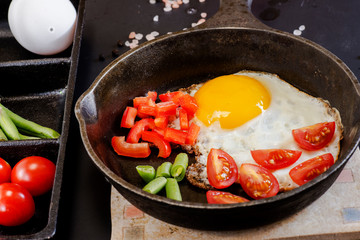 cooked scrambled eggs in pan