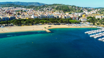 Fototapeta na wymiar Aerial view in Sant Feliu de Guixols, coastal village of Costa Brava, Girona. Catalonia,Spain.Drone Photo
