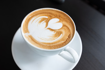 Cup of coffee with beautiful Latte art