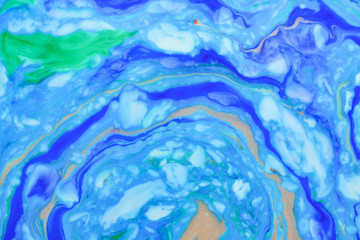 Beautiful abstract painting is a painting technique Ebru .Turkish Ebru style on the water with acrylic paints wring wave.Stylish combination of luxury.Contemporary art marble liquid texture 