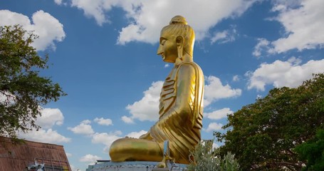 Golden Buddha statue, Buddha Kittisiri ChaiThe beautiful temple is located next to the sea. At Prachuap Khiri Khan in Thailand