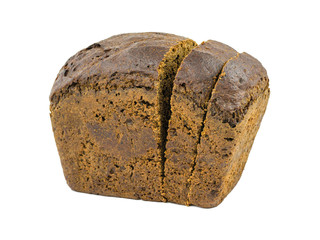 A loaf of dark bread with cut pieces isolated on a white background.
