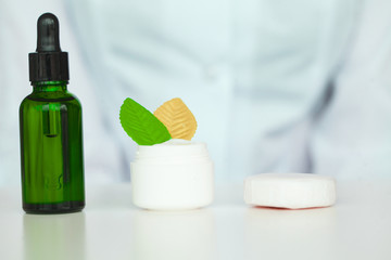 Scin Care. Scientist hands testing texture of beauty products