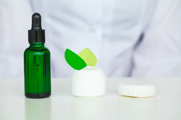Scin Care. Scientist hands testing texture of beauty products