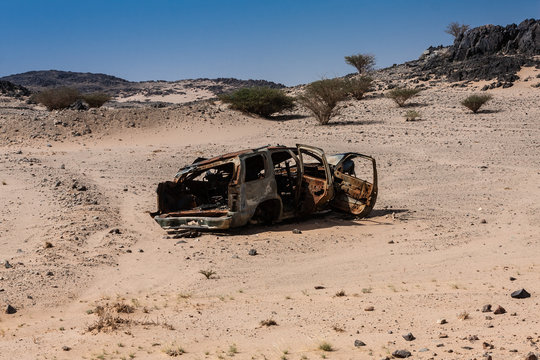 The frame of the burnt car roadside the Almardamah Road, Saudi Arabia