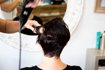 Fototapeta premium Woman at the hairdresser