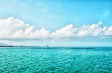 Fototapeta na wymiar blue sea and sky with small island ,landscape nature wallpaper background