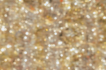 Abstract gold bokeh blur of soft light