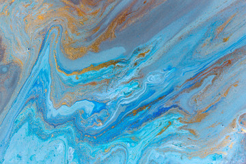 Fototapeta na wymiar Blue marbling pattern. Golden marble liquid texture.