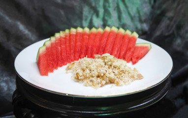 Watermelon sliced with sweet dried fish crispy shallot dip