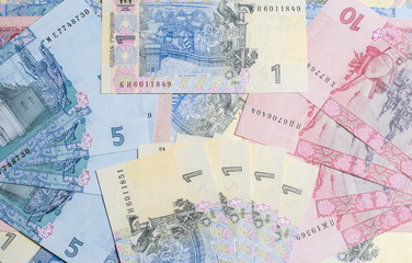 Fototapeta na wymiar Ukrainian money. Hryvnia paper bill. Small paper notes. Cash. Background texture.