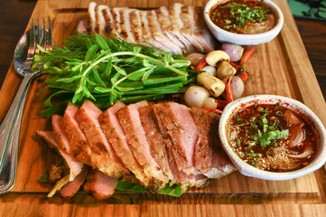 Grilled beef and pork with local vegetables and spicy sauce, Thai food