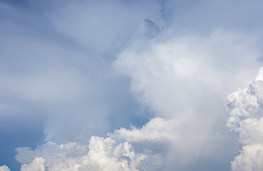 The beauty of the sky with clouds and the sun in summer.