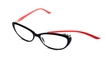 Broken glasses on white background. The concept of optics repair, vision impairment. Vision...