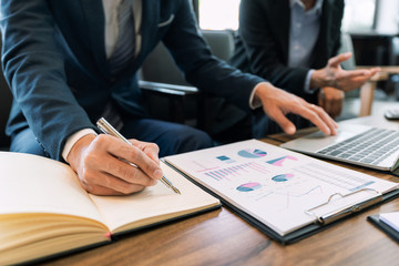 business people and coworker colleagues discussing explanations about week working plan project cooperating in modern coworking office.
