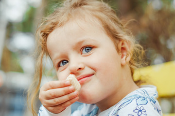 little girl joyful on the street