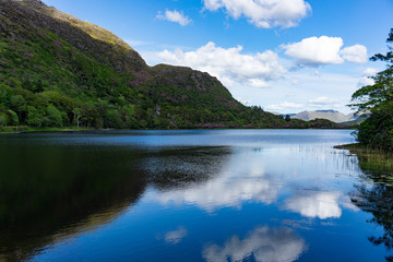 Fototapeta na wymiar Lake landscape with mountain peaks, Pollacapall Lough in, Connemara, Galway, Ireland.