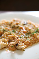 Seafood Risotto , traditional italian rice on table
