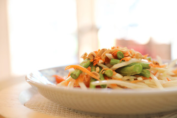 Green papaya salad or Som tam in Thai street food