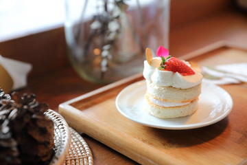 Strawberry cake dessert on wood table