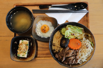 Sukiyaki donburi , sukiyaki hot pot stew with Japanese rice in bowl Japanese food